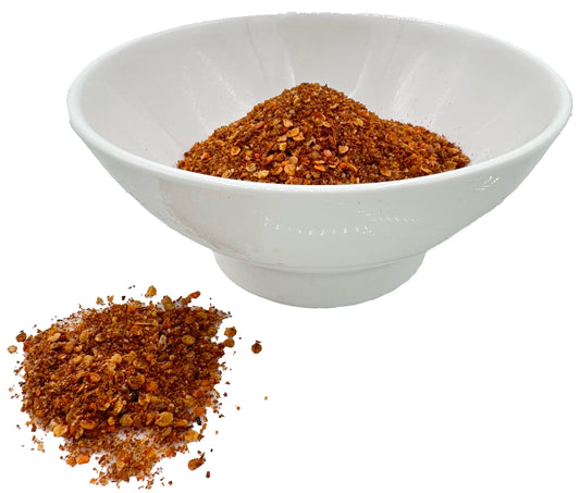 Piment pili-pili moulu dans un sachet refermable - Piment rouge au goût intense, idéal pour sauces et huiles pimentées.